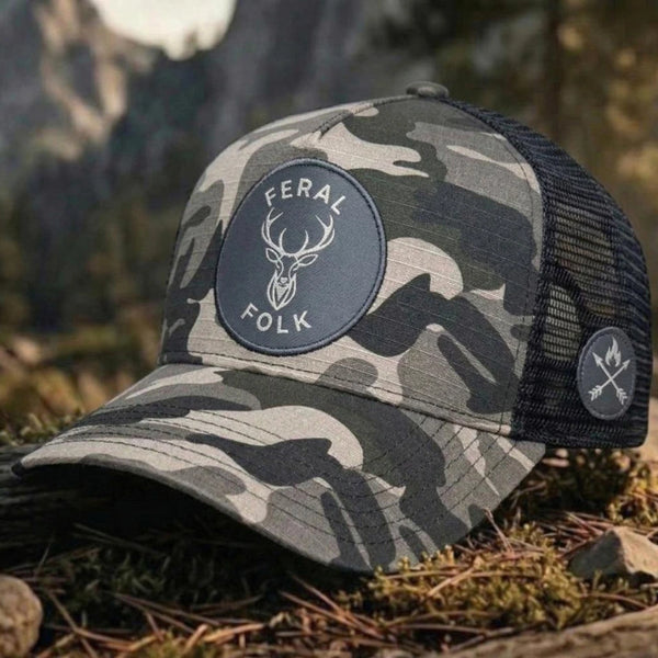 DROP 001: THE WOODLAND STAG 'WILD ROOTS' CAMO TRUCKER