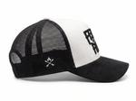 Black and white cap with mesh back and logo on a white background