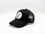 black ferak folk cap on a white background