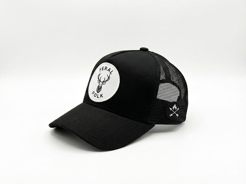 black ferak folk cap on a white background